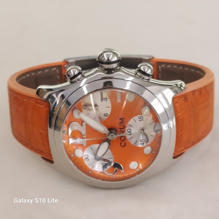 CORUM Bubble Usato acciaio quarzo  45 mm Quadrante Arancione ref 396.150.20