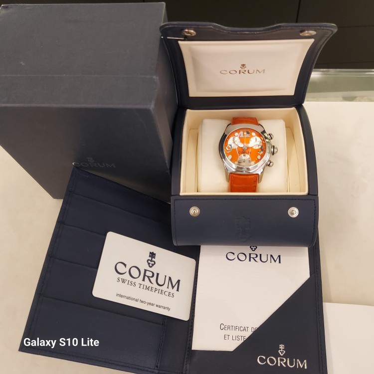 CORUM Bubble Usato acciaio quarzo  45 mm Quadrante Arancione ref 396.150.20